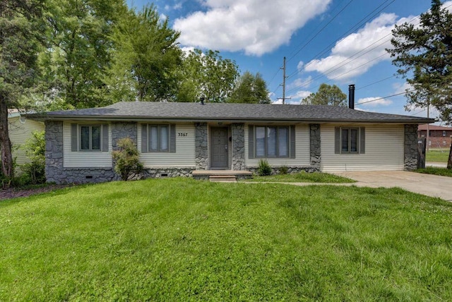 ranch-style home with a front lawn