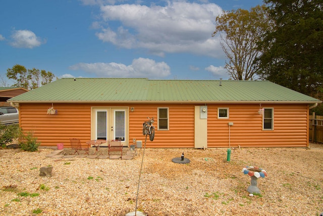 back of property with a patio area