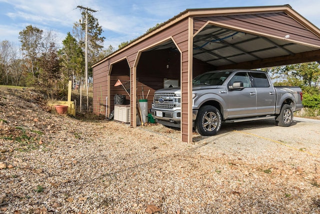 view of parking / parking lot with a carport