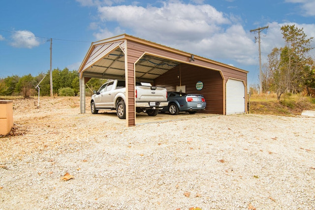 view of vehicle parking featuring a carport