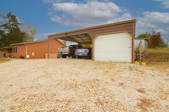 exterior space featuring a garage and a carport