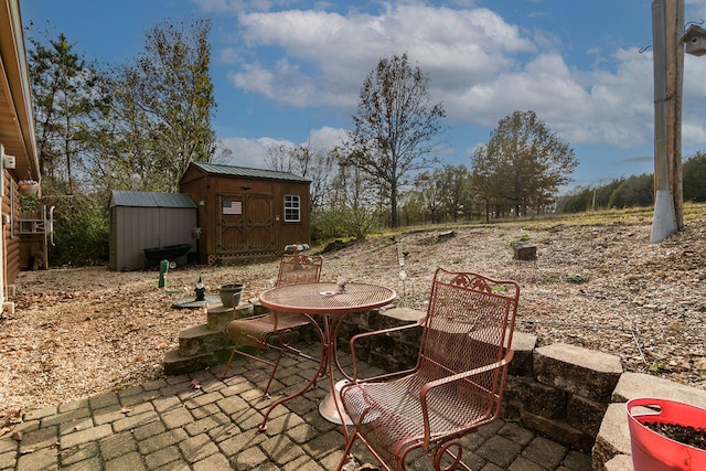 view of patio / terrace featuring a shed