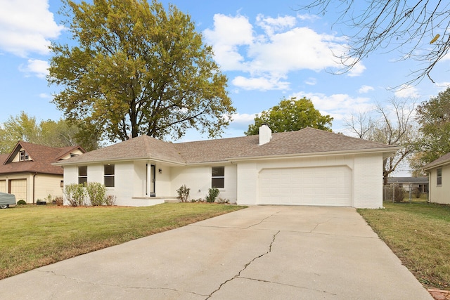 ranch-style house with a front lawn and a garage