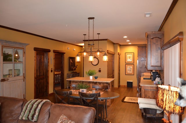 24 Village Trl Unit 1, Branson, MO 65616 - dining space with dark wood-type flooring, crown molding, baseboards, and recessed lighting