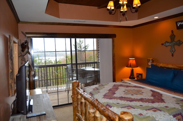 bedroom featuring an inviting chandelier, carpet flooring, and ornamental molding