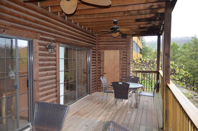 24 Village Trl Unit 1, Branson, MO 65616 - deck with ceiling fan and outdoor dining area