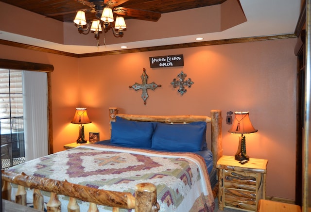 bedroom featuring wood ceiling, ceiling fan, and crown molding