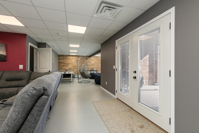 1558 E 432nd Rd, Bolivar, MO 65613 - interior space with concrete flooring, a drop ceiling, and french doors