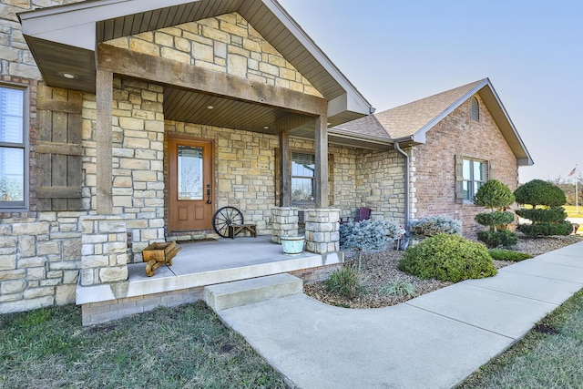 1558 E 432nd Rd, Bolivar, MO 65613 - view of exterior entry with stone siding and covered porch