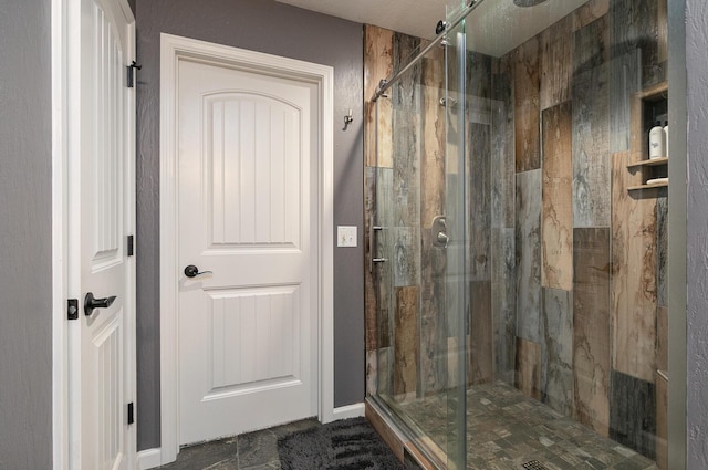 1558 E 432nd Rd, Bolivar, MO 65613 - bathroom with a marble finish shower and baseboards