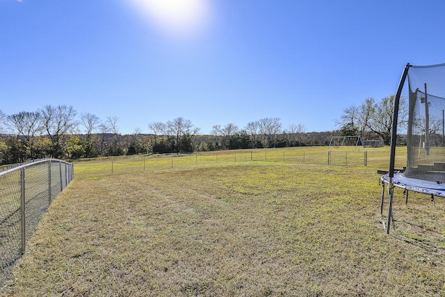 1558 E 432nd Rd, Bolivar, MO 65613 - view of yard featuring a trampoline and a view of countryside