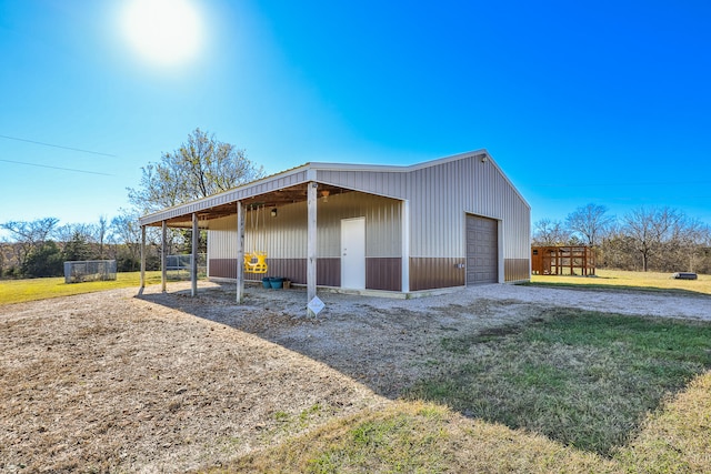 garage with a lawn