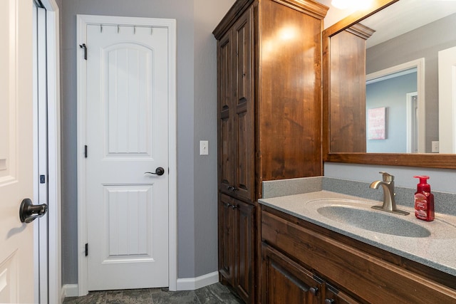 1558 E 432nd Rd, Bolivar, MO 65613 - bathroom featuring vanity and baseboards