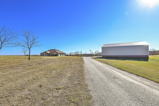 1558 E 432nd Rd, Bolivar, MO 65613 - view of dirt / gravel road