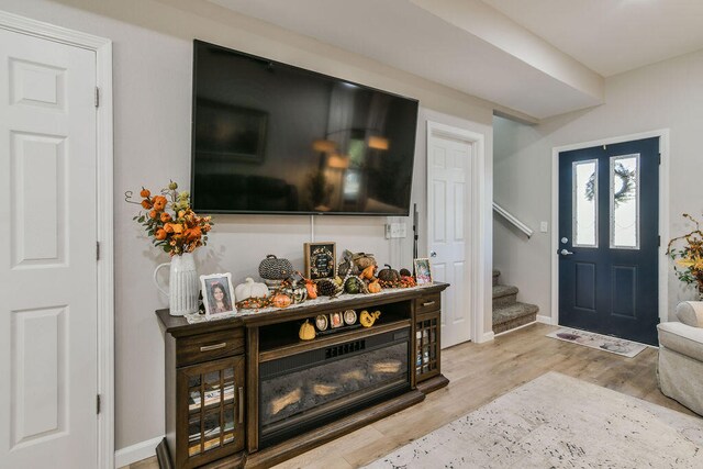 foyer with light hardwood / wood-style floors