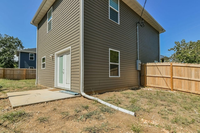 rear view of house with a patio