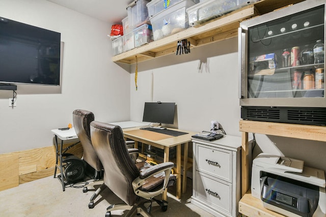 home office with concrete flooring