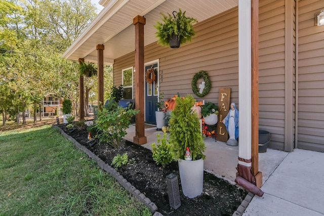 view of patio featuring a porch