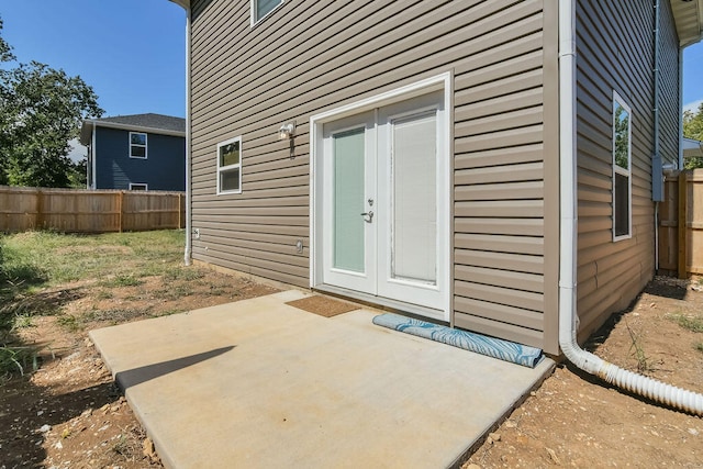 doorway to property featuring a patio area