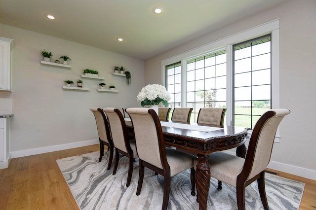 dining room with light hardwood / wood-style flooring