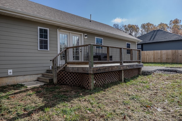 back of house featuring a deck