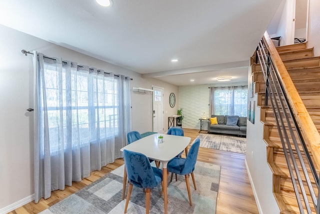 dining area with light hardwood / wood-style floors