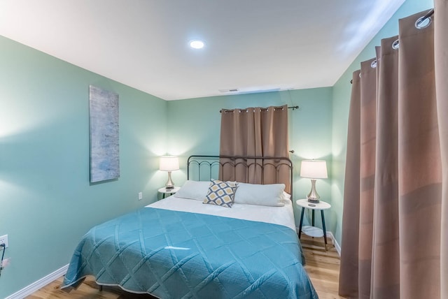 bedroom featuring light wood-type flooring