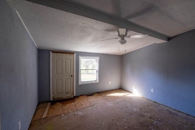 interior space featuring ceiling fan