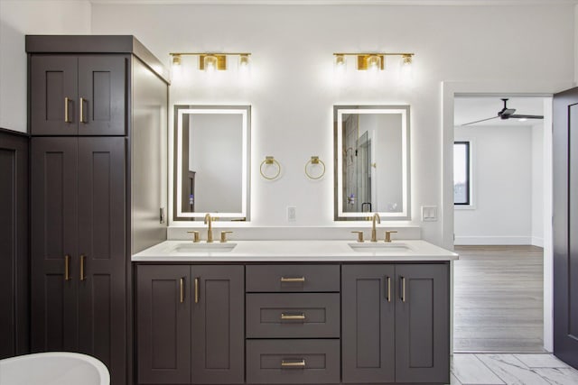 bathroom with vanity and ceiling fan