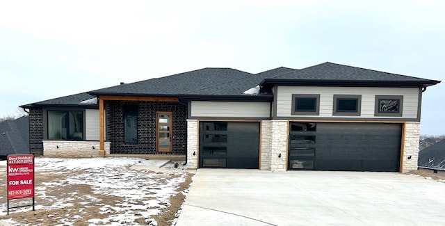 prairie-style home with a garage