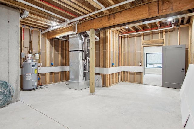 basement with heating unit and electric water heater