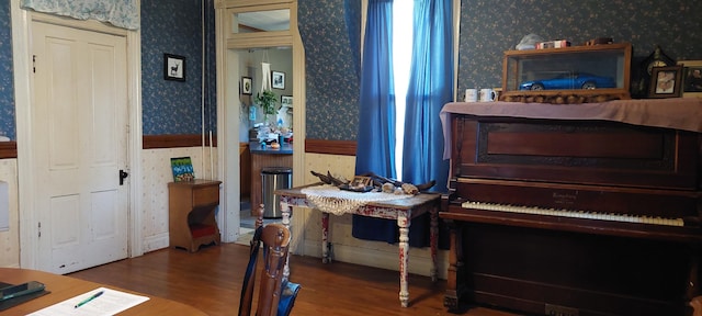 miscellaneous room featuring dark hardwood / wood-style floors