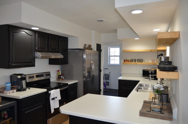 kitchen with kitchen peninsula and stainless steel appliances