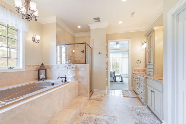 bathroom with ceiling fan with notable chandelier, vanity, plus walk in shower, and ornamental molding