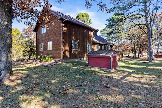 view of home's exterior with a lawn