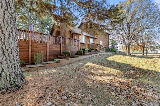 view of yard featuring a wooden deck