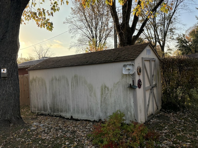 view of outdoor structure at dusk