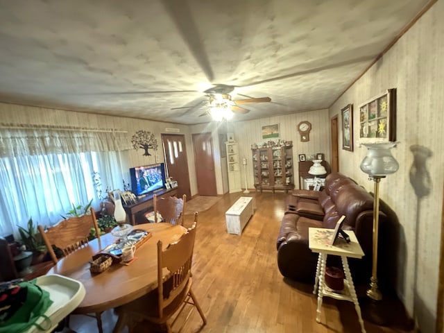 interior space with ceiling fan and light wood-type flooring