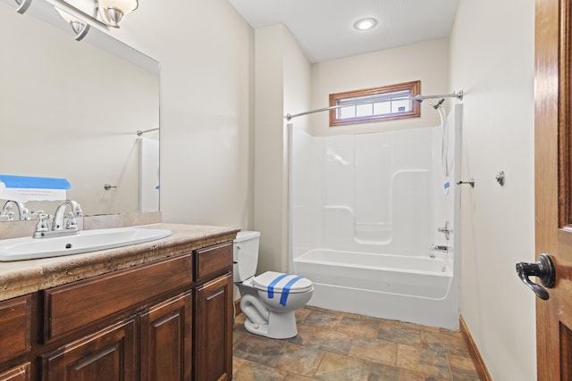 full bathroom with vanity, toilet, and shower / washtub combination