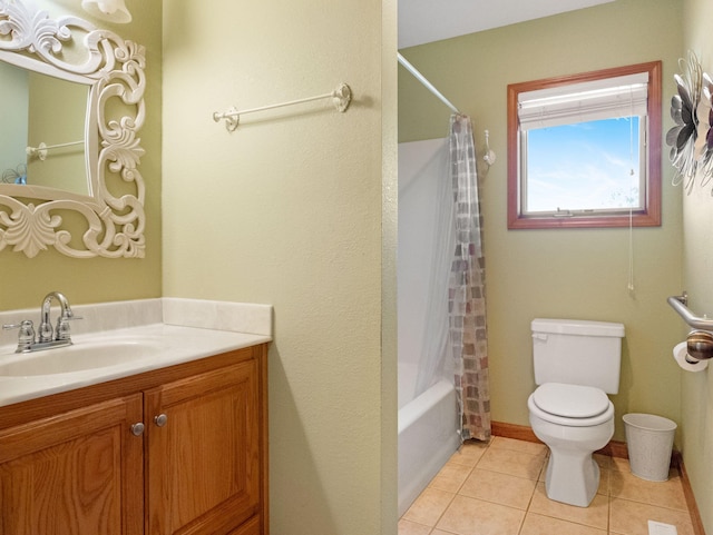 full bathroom with shower / tub combo with curtain, vanity, toilet, and tile patterned flooring