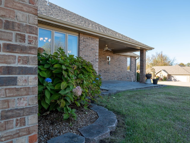 exterior space featuring ceiling fan and a patio area