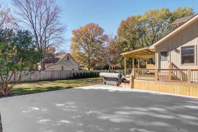 view of patio / terrace with a pergola and a deck