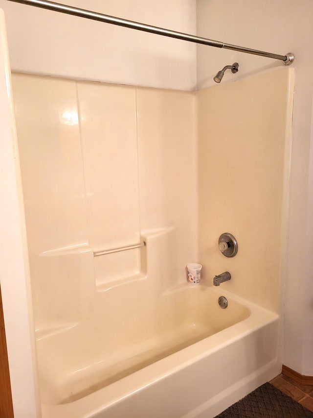 bathroom with shower / bath combination