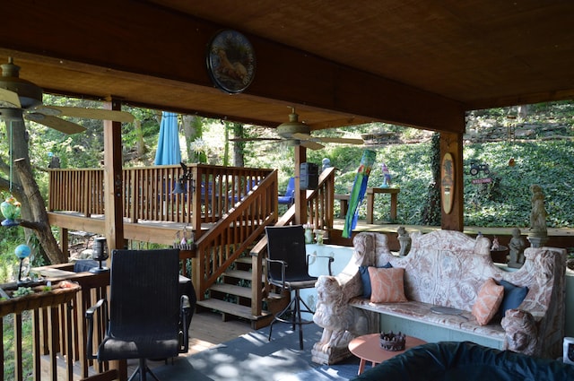 view of patio featuring ceiling fan and a wooden deck