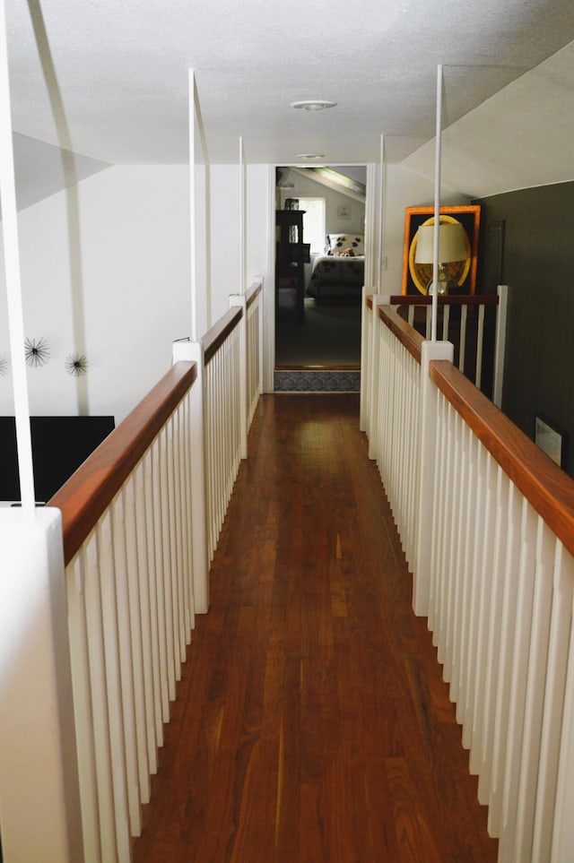 hallway featuring dark hardwood / wood-style floors