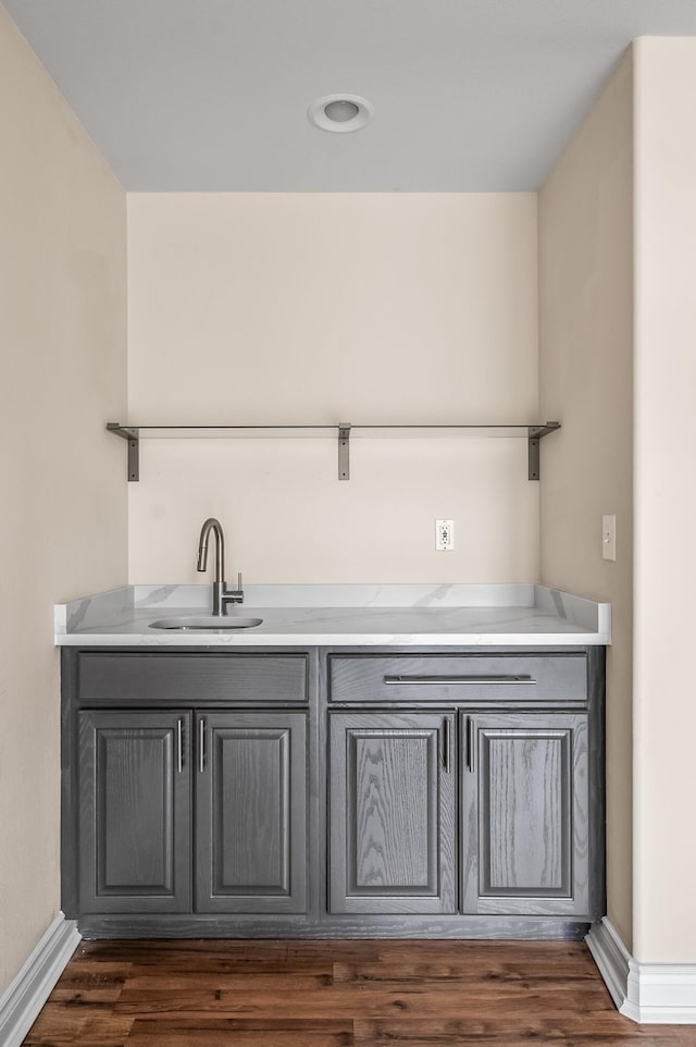 bathroom with vanity and wood-type flooring