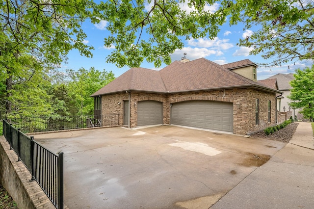 view of home's exterior featuring a garage