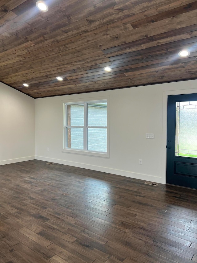 unfurnished room with dark wood-style floors, wood ceiling, baseboards, and recessed lighting