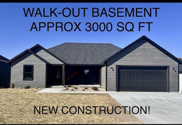 view of front of house with a garage and driveway