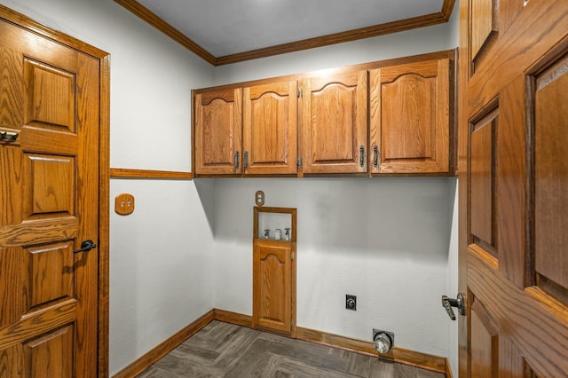 washroom featuring crown molding, hookup for an electric dryer, hookup for a washing machine, cabinets, and dark parquet flooring